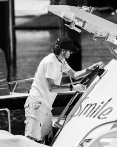 man wearing a hat on a boat