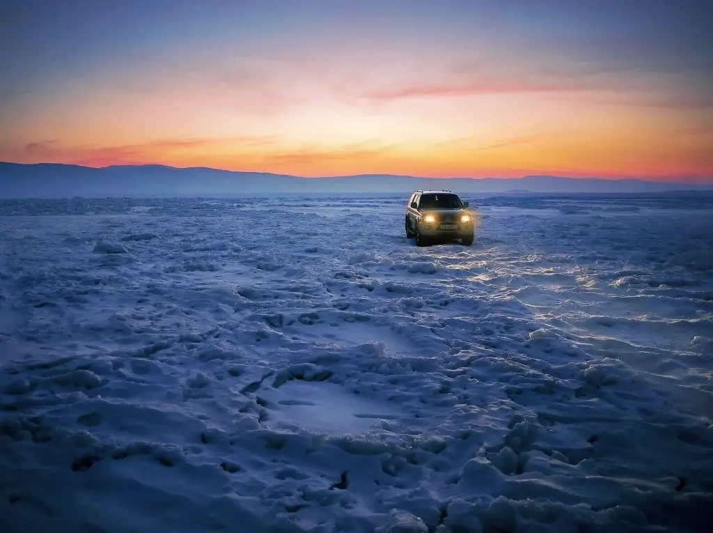 Truck on the Winter Ice and Snow Car Ready for Winter