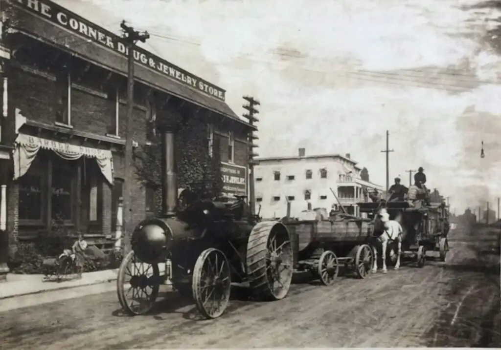 Tractor in Front of Harbor Beach Corner Drug and Jewelry Store