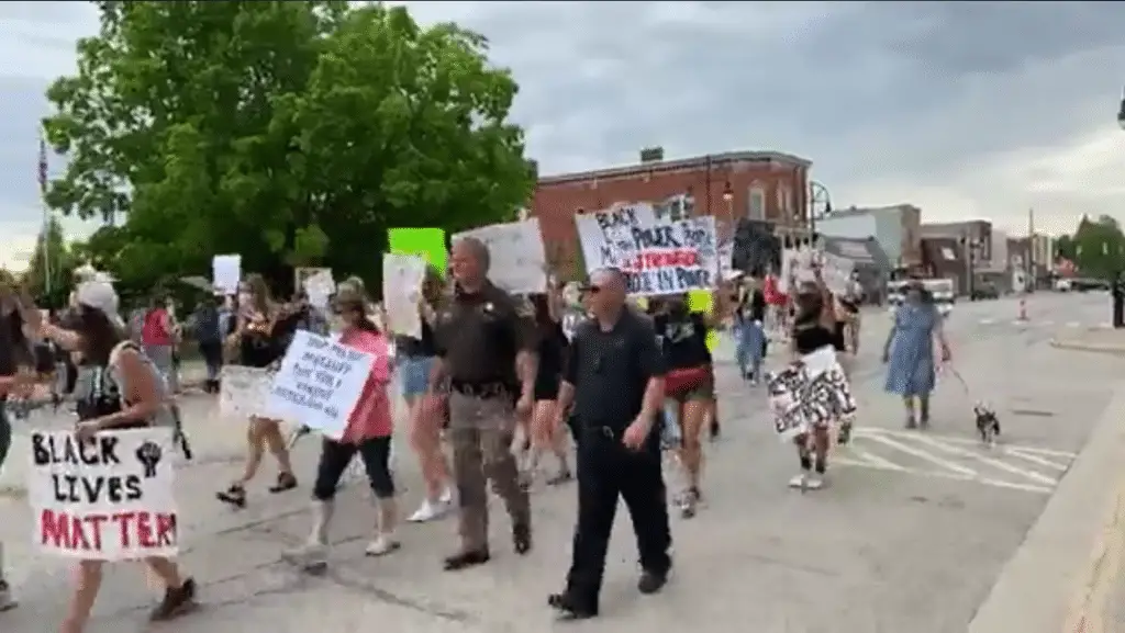 Bad Axe Protest With Police Marching