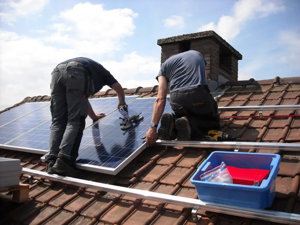 Installing solar panels on a roof