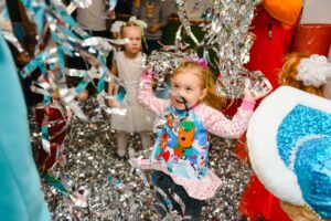 photo of girl having fun in birthday party