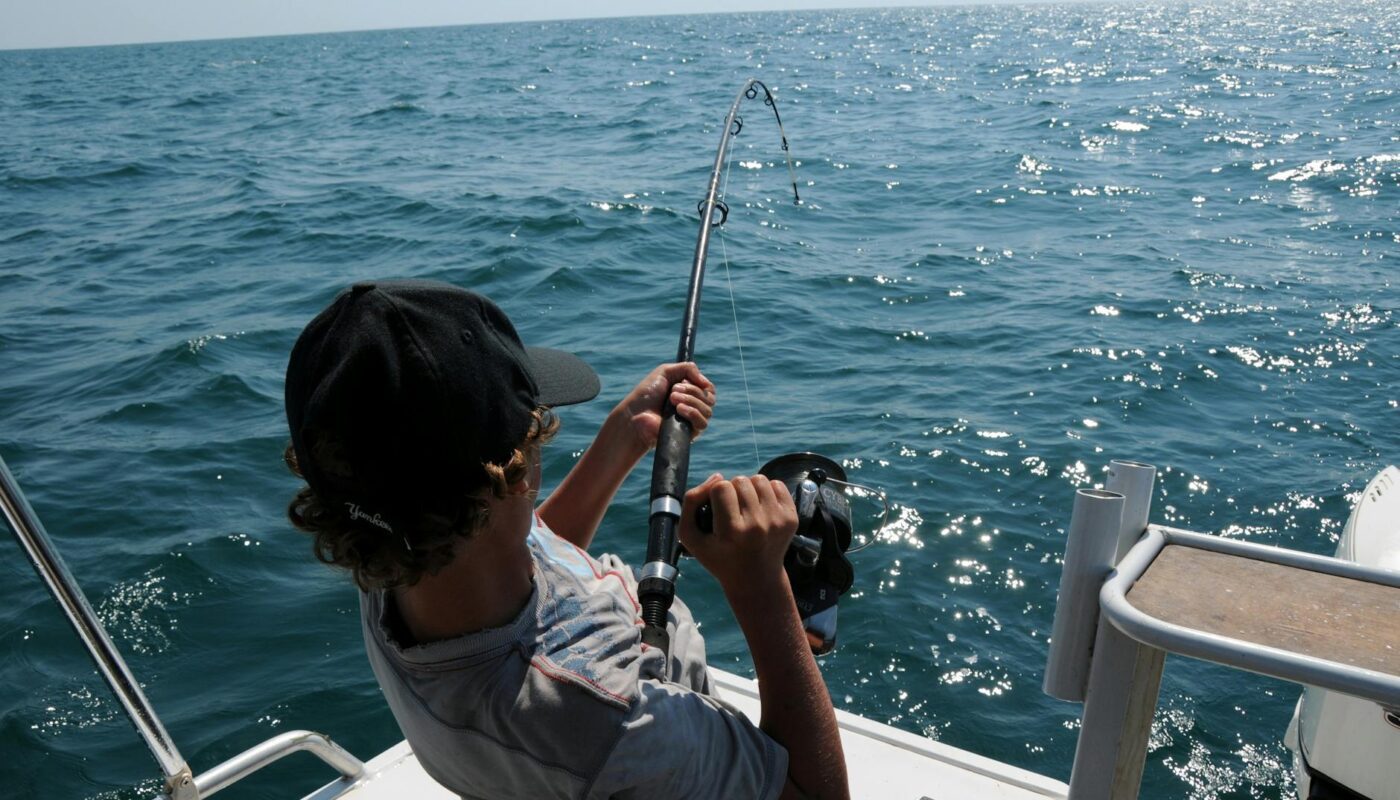 photo of man fishing