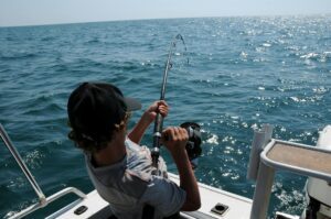 photo of man fishing