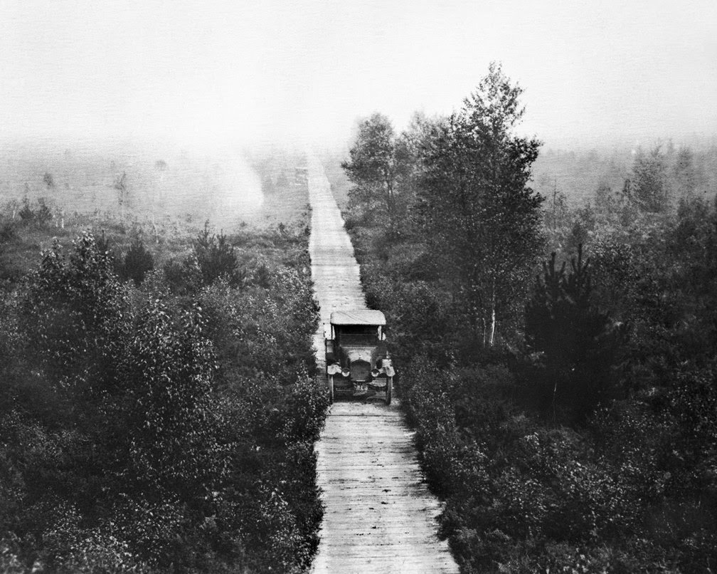 Old car on a foggy road