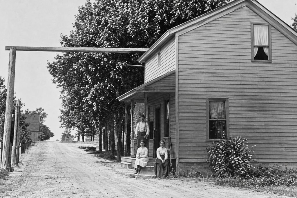 Historic house with people outside