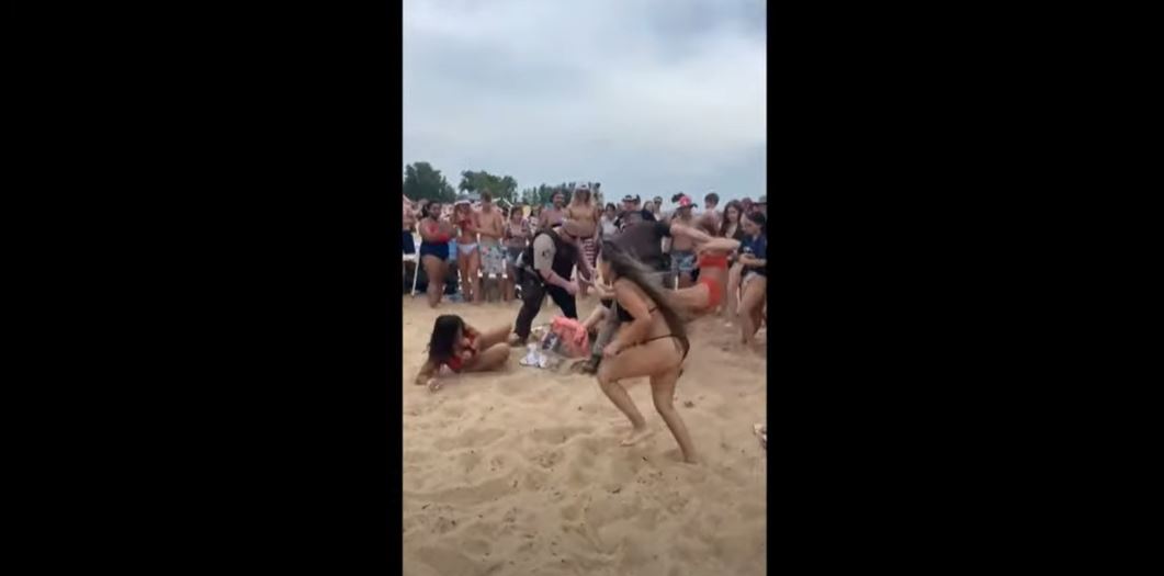 Sheriff Breaking Up Beach Fight