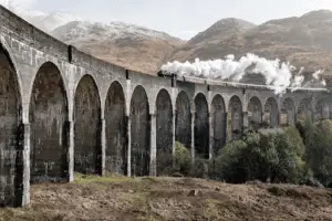 Steam Train Going Over Bridge