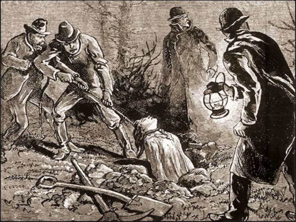 Grave robbers with lantern and tools.