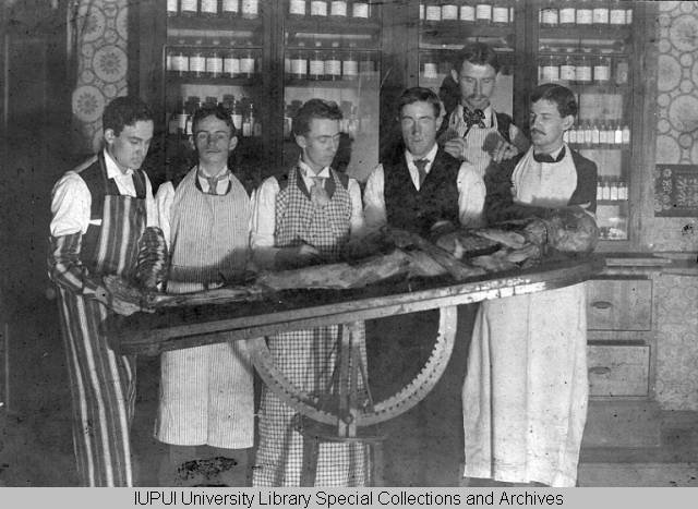 Historical medical demonstration with students