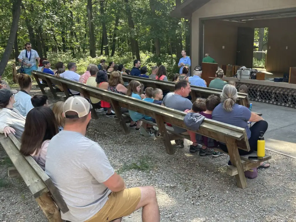 Spectators observing birds of prey at the Huron County Nature Center event