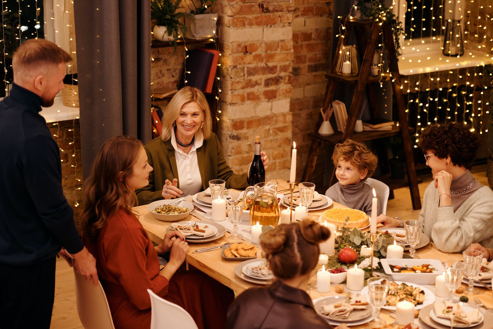 family celebrating christmas dinner