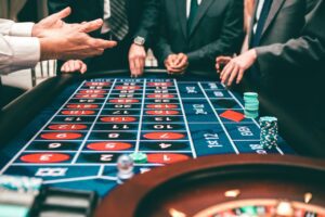A roulette wheel spinning in a vibrant Michigan casino