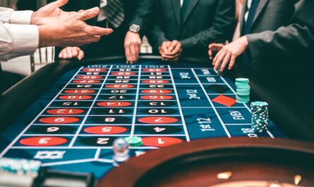 A roulette wheel spinning in a vibrant Michigan casino