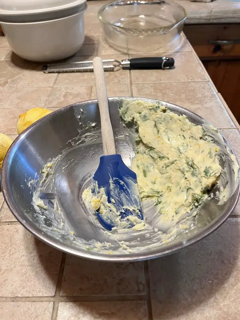 Butter, lemon zest, garlic, and parsley topping