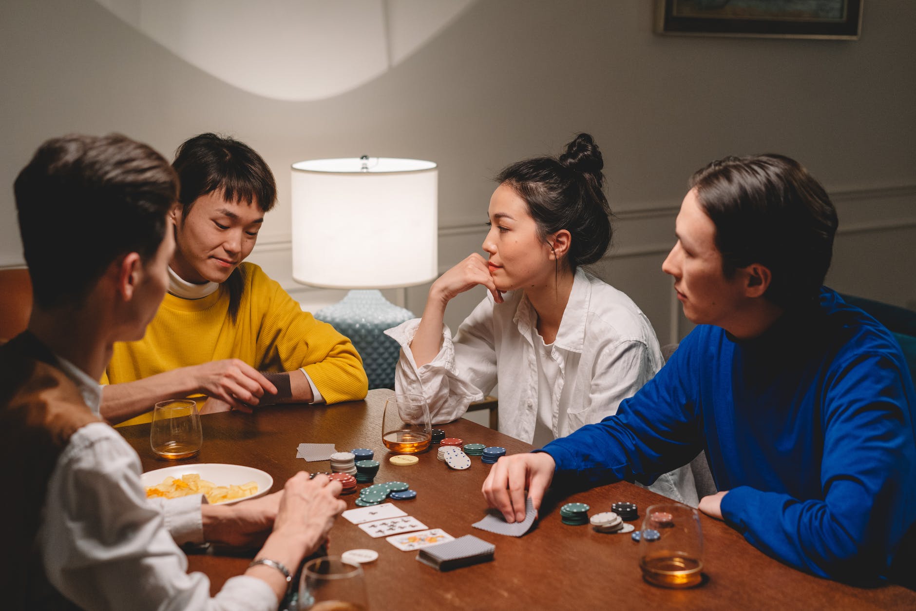 group of people playing poker