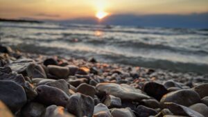 Michigan Rockhounding enthusiasts searching for rocks along Lake Michigan