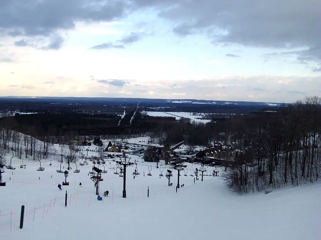 View of Cheers Chair lift and trails at Crystal Mountain resort in Michigan, USA.