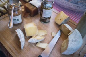 sliced cheese and knife
