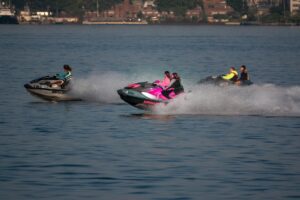 a group of people on jet skis