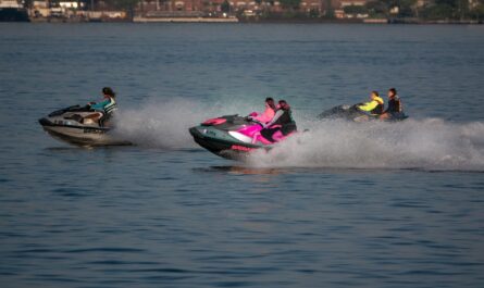 a group of people on jet skis