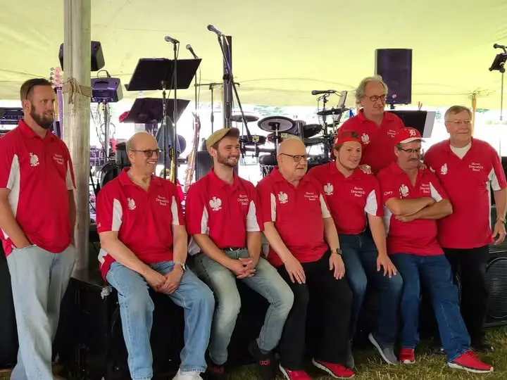 Group of people in matching shirts.
