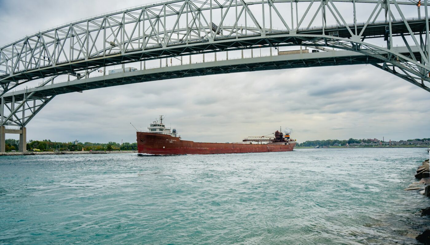 a boat under a bridge