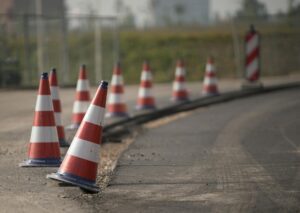 traffic cones in row on road edge