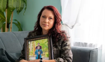 a woman holding a picture