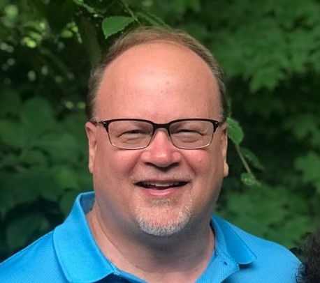 a man in a blue shirt