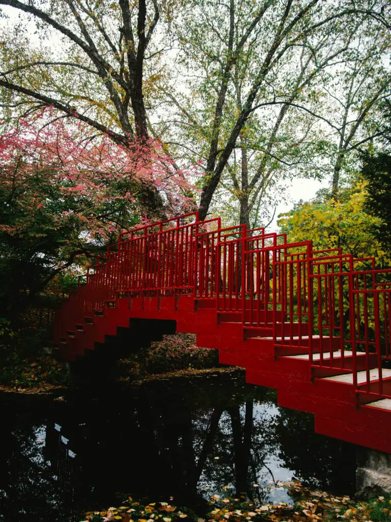 A red bridge over a river.