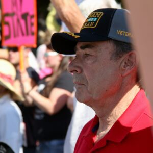 a man in a red shirt