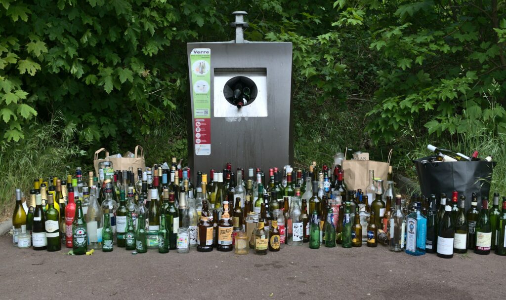 a group of bottles of alcohol outside