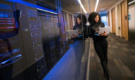 engineer holding laptop