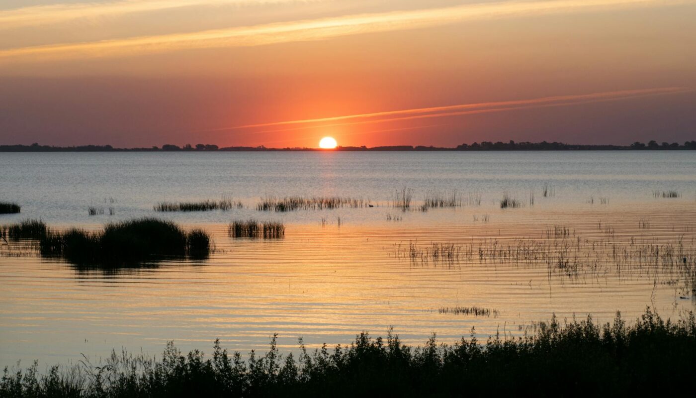 serene lakeside sunset at chascomus argentina