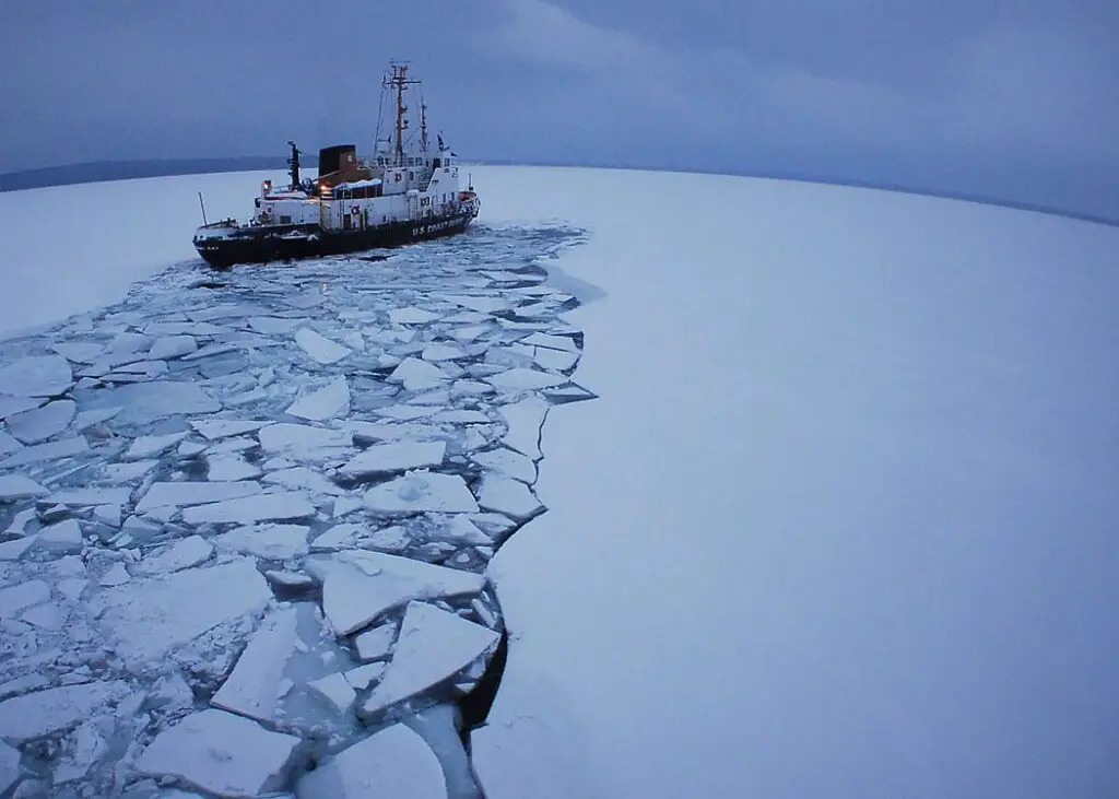 a boat on ice in the ocean