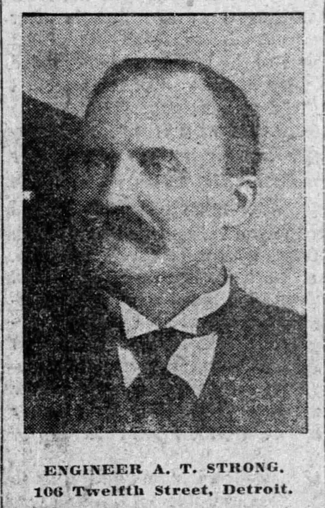 a man with a mustache in a black and white photo