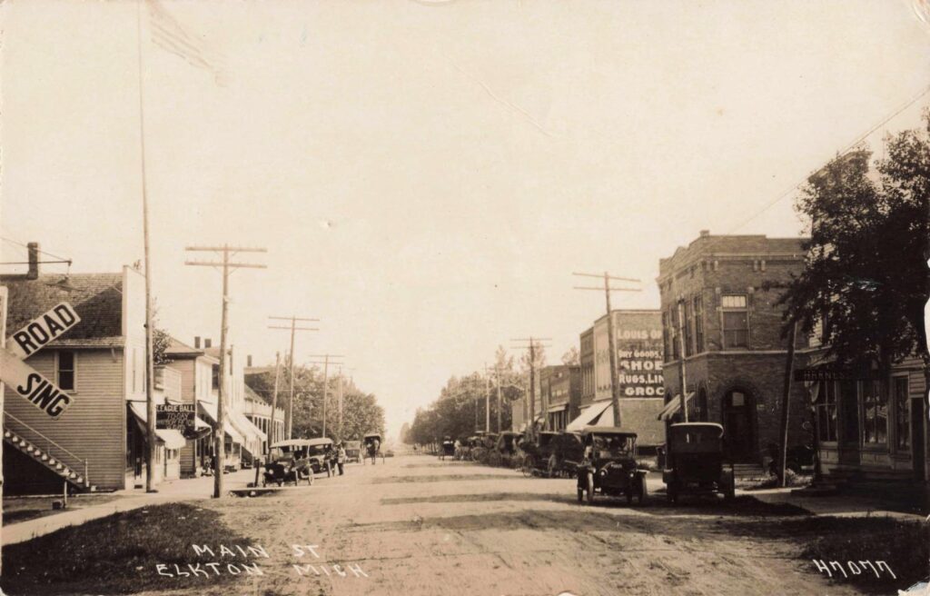 Elkton Main Street with automobiles (c.1920s).