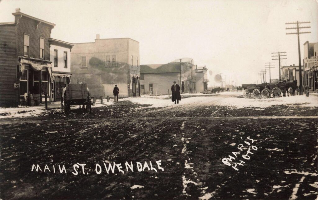 Snowy street in early 1900s
