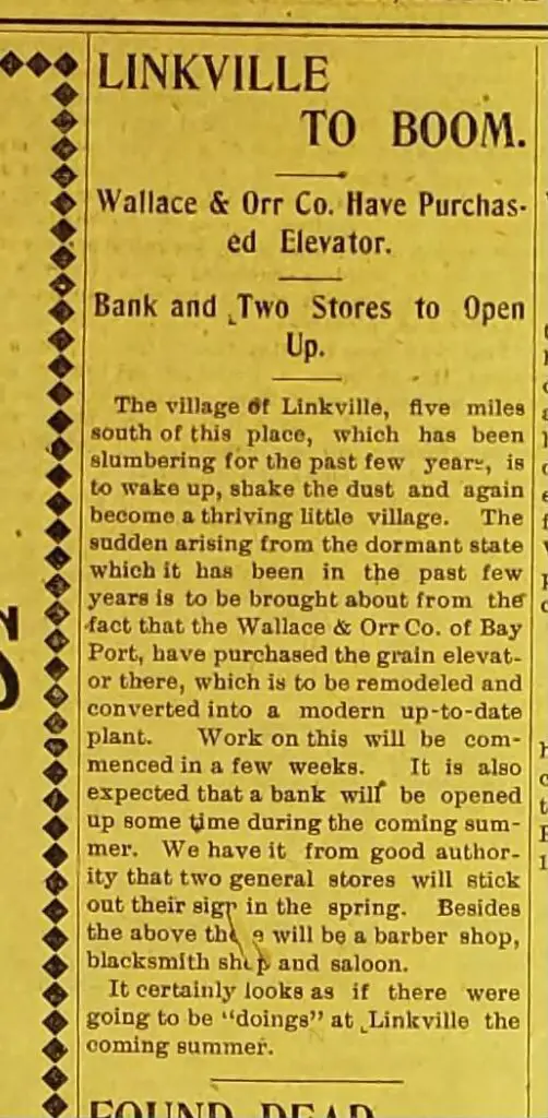 a yellow newspaper with black text