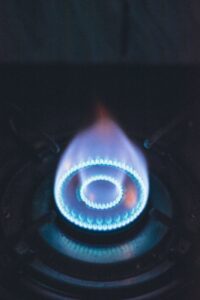 close up of a blue flame on a gas burner