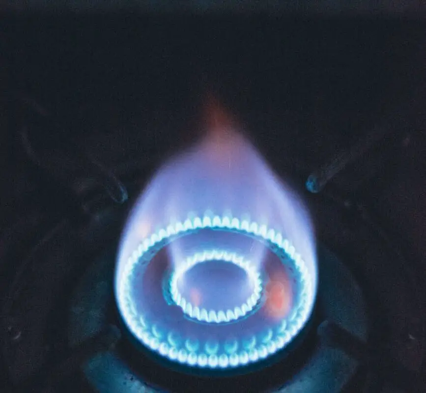 close up of a blue flame on a gas burner