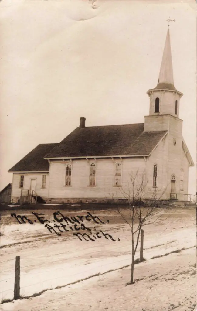 a white church with a steeple