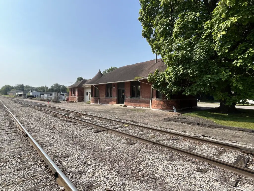 history of vassar michigan - train tracks next to a building