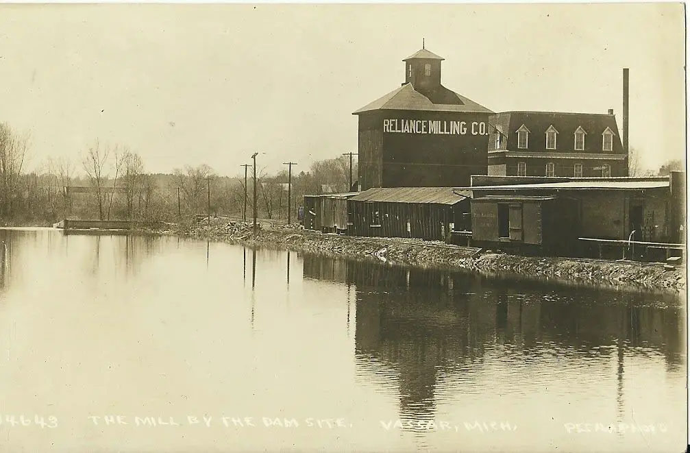 a building next to a body of water