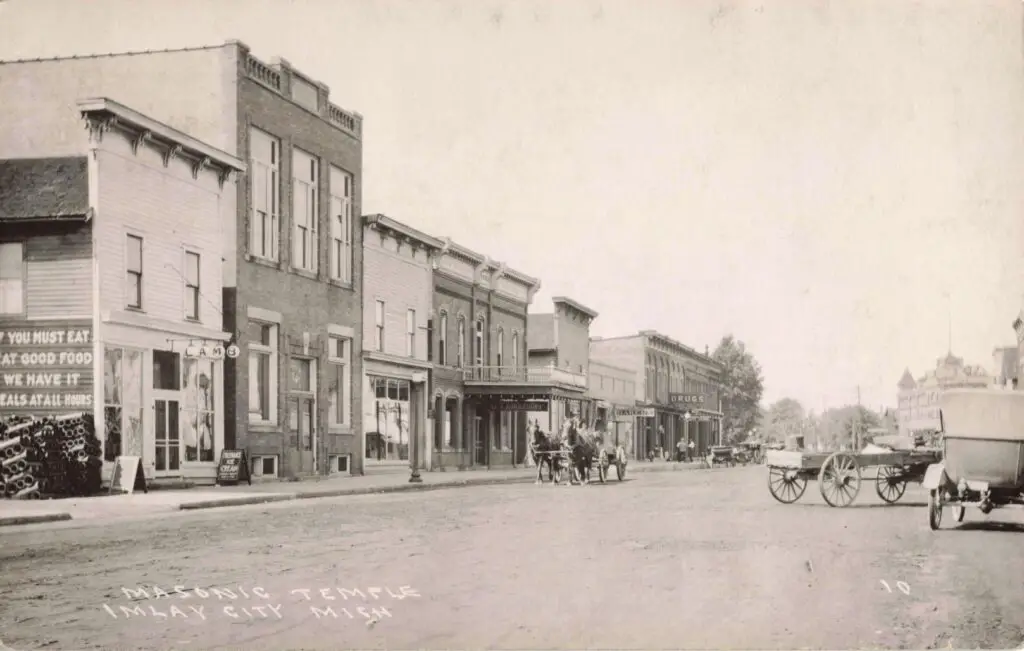 a horse drawn carriage on a street