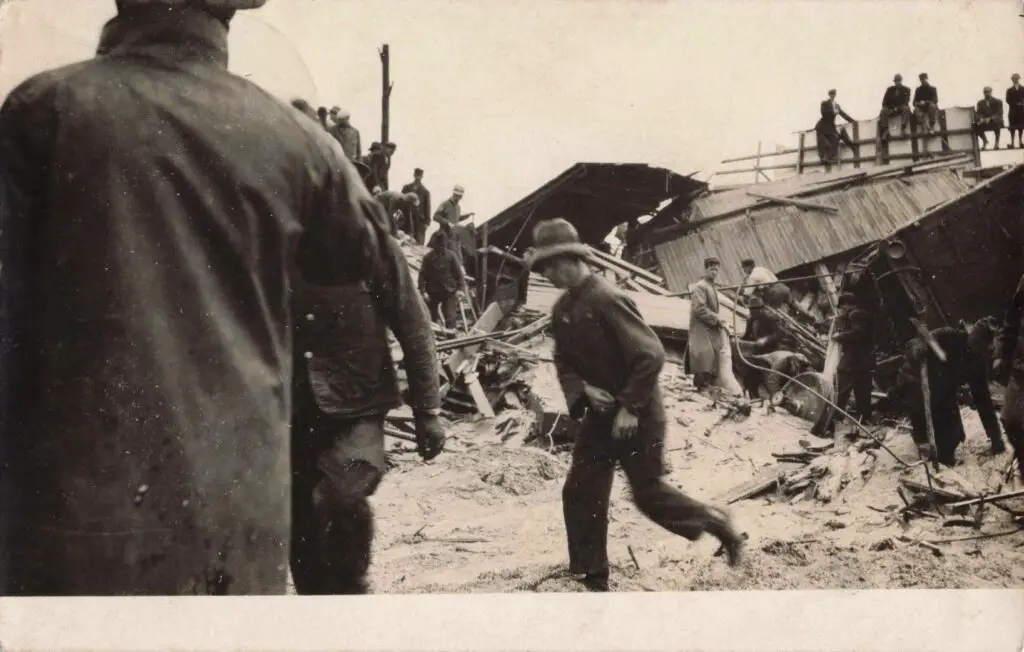 a group of people in a destroyed building