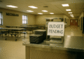 a sign on a table in a school