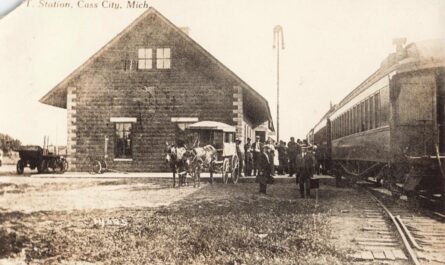 a group of people standing outside a train station