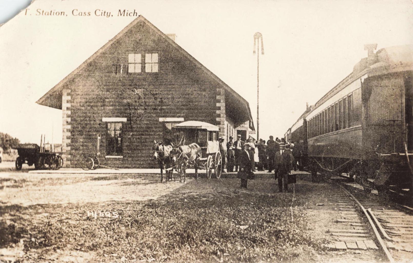 a group of people standing outside a train station